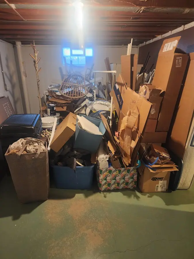 Roll-off dumpster container at job site for 4 Yard Dumpster Rental in Rifle